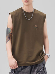 Men's oversized cotton tank top in caramel with embroidered detail on chest.