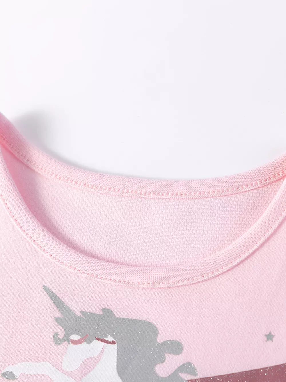 Pink cotton toddler dress with a glitter unicorn print and crew neck.