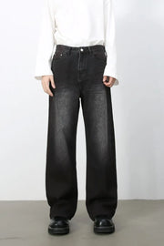 Faded dark wide-leg denim jeans with a casual, chic look.