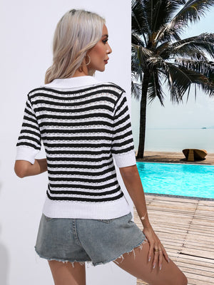 Black and white striped knit polo top with short sleeves and a collar.