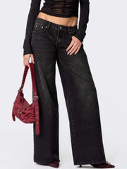 Black wide leg denim jeans with button fly and ankle length.