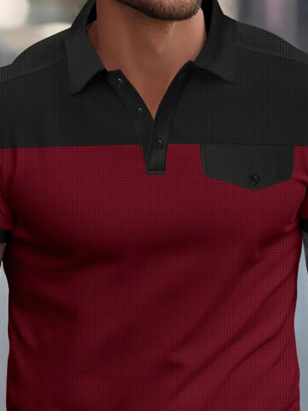 Burgundy and black waffle knit polo shirt with a chest pocket detail.
