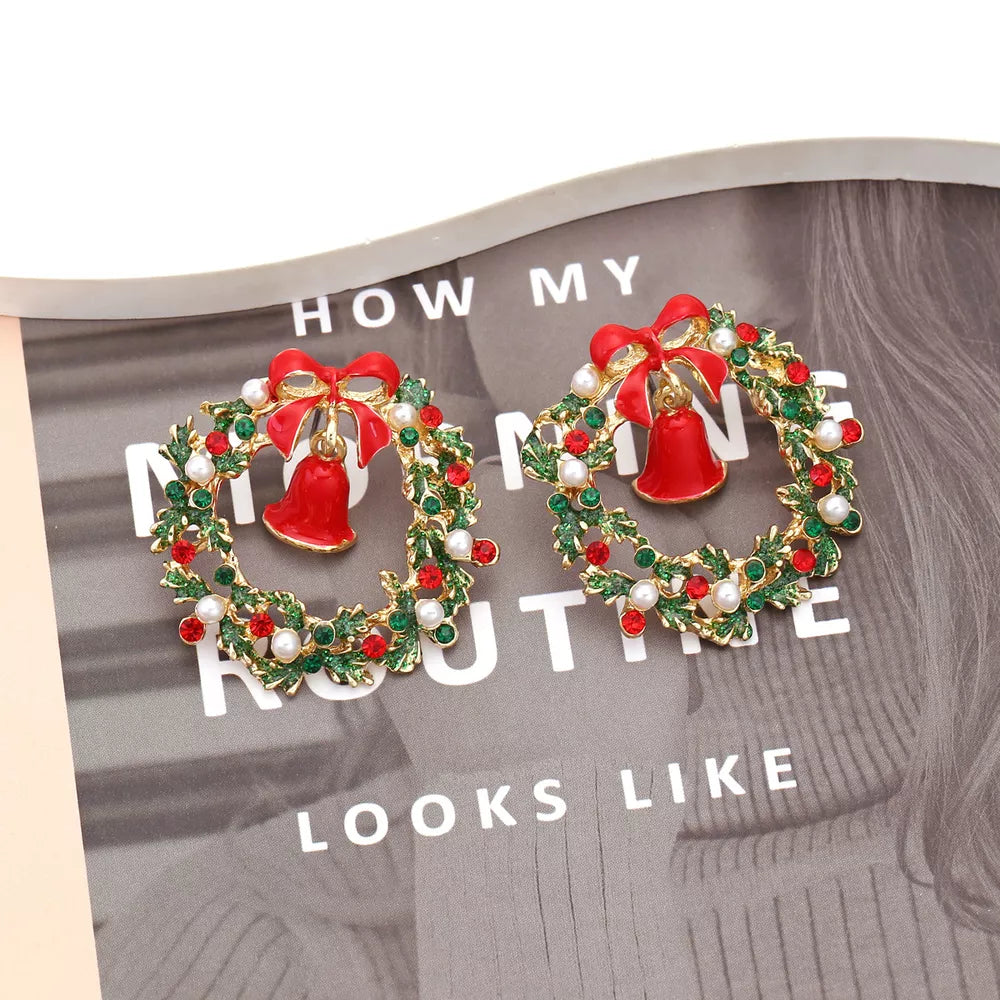 Festive wreath bell earrings with red bows, pearls, and red gems.