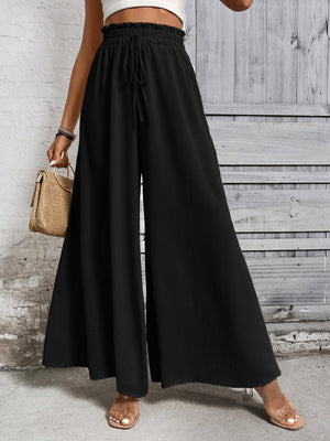 Black ruffled waistline palazzo trousers with drawstring and wide leg