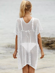 White V-neck ruched cover-up with open knit texture and short sleeves.