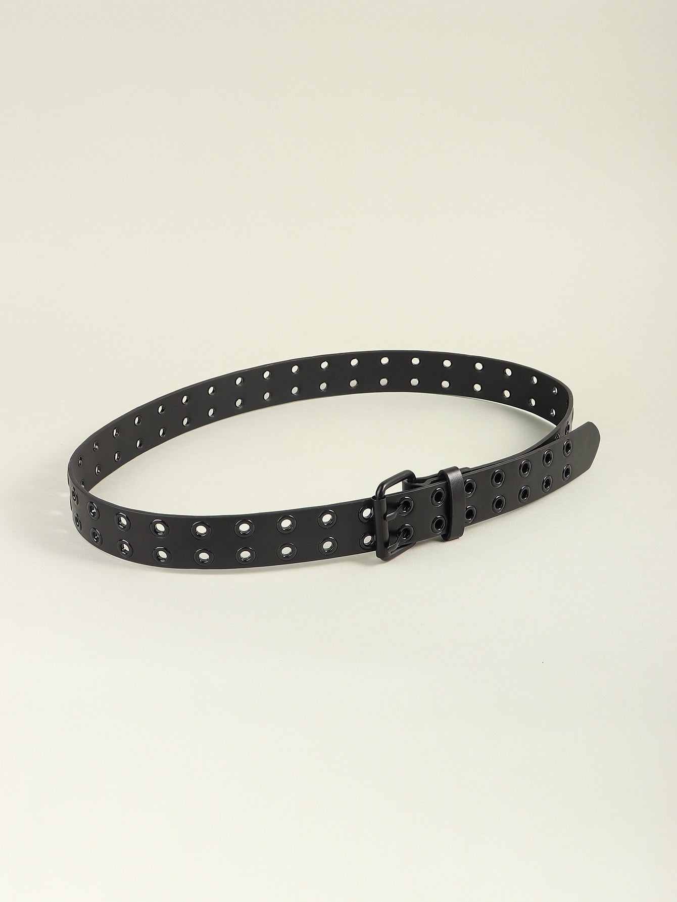 Black vegan leather belt with double row of grommets and black buckle.