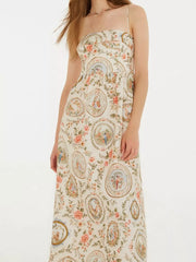 Vintage floral midi dress with spaghetti straps and a charming cameo print.