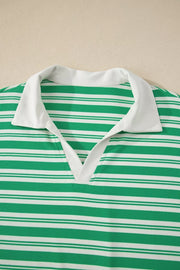 Green and white striped midi dress with collared V-neck and white trim