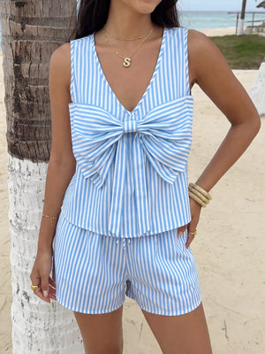Blue and white striped two-piece set with a large bow detail on the top and drawstring shorts.