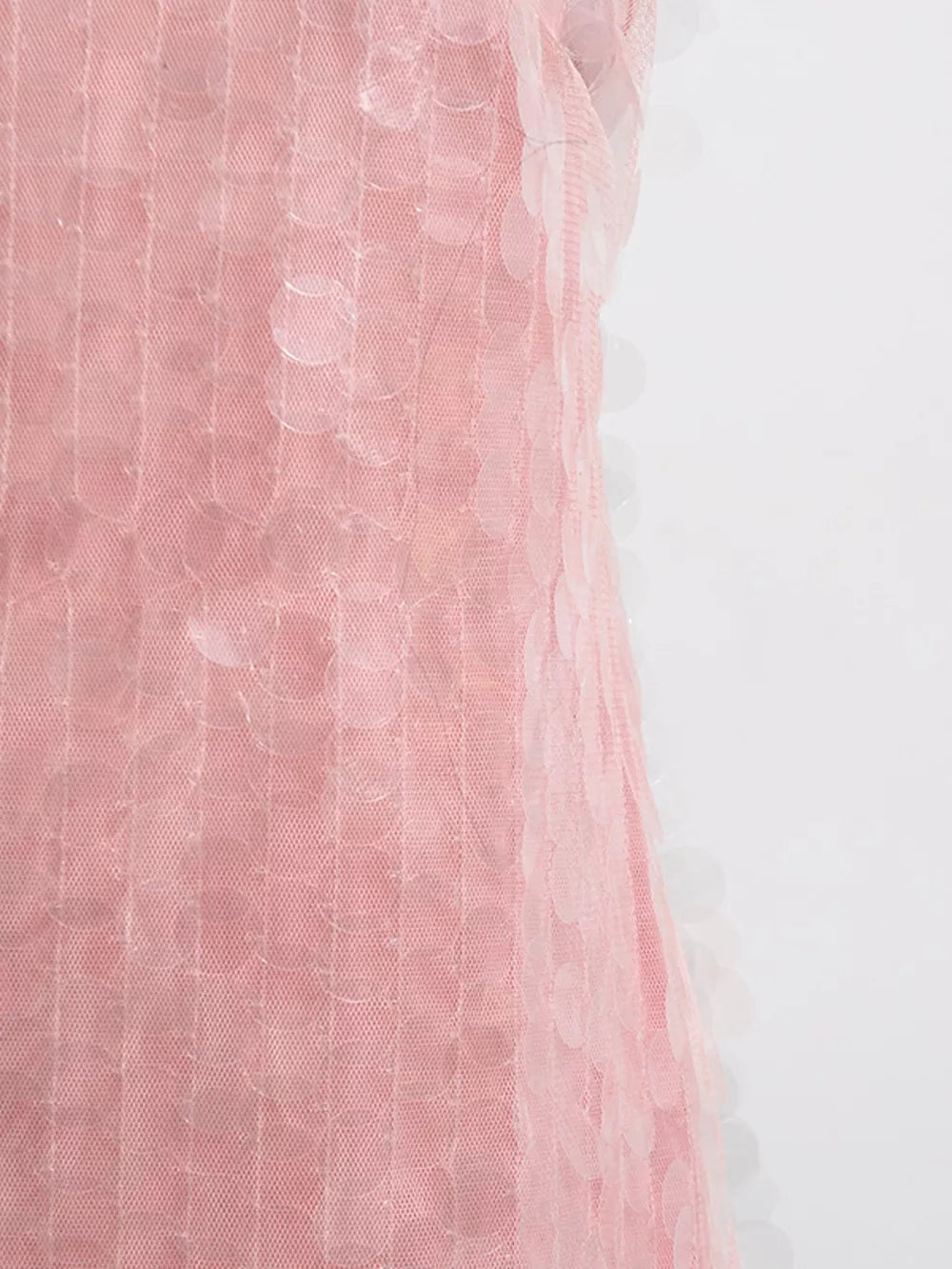 Pink iridescent sequin halter mini dress with mesh overlay and circular sequin details.