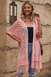 Blush pink open knit chevron fringe cardigan with short sleeves and boho styling.