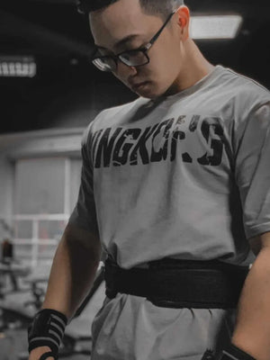 Gray oversized graphic tee with King Kong's text detail.