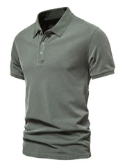 Sage textured polo shirt with short sleeves and buttoned placket.