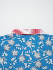 Blue cotton blouse with floral print and red striped collar detail.