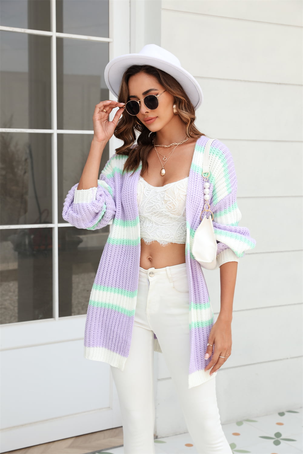 Lavender and mint open knit cocoon cardigan with rainbow stripes and balloon sleeves.