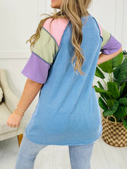 Color block patchwork henley t-shirt with waffle knit texture and striped blue body.