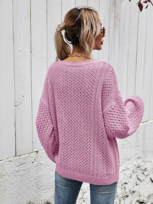 Open-knit sweater in Moonlit Mauve with balloon sleeves and a relaxed fit.