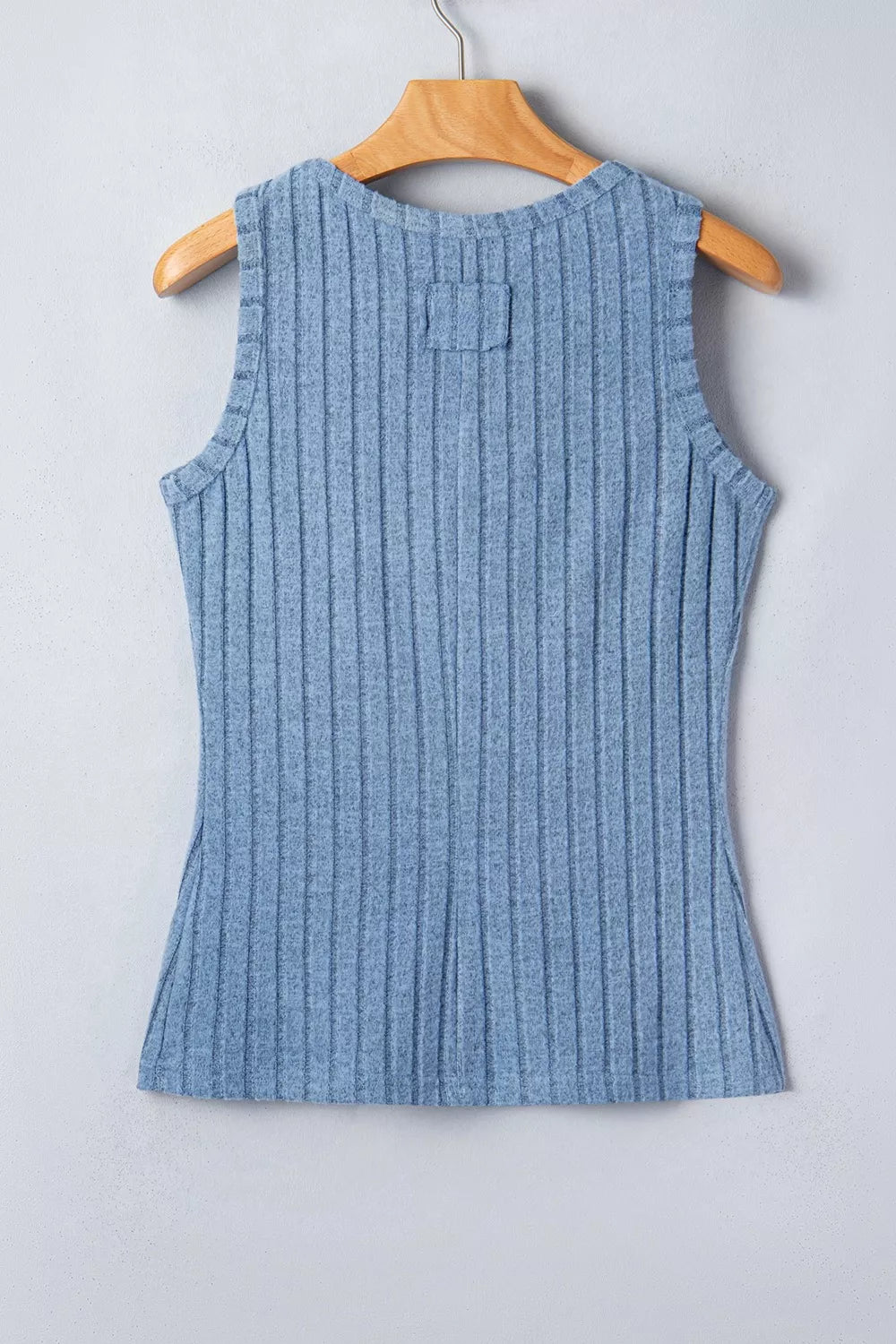 Textured blue ribbed slim-fit tank top with a square detail on the back.