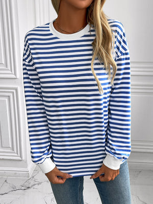 Horizontal stripe crewneck sweatshirt in royal blue and white with white cuffs.