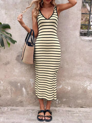 Ribbed striped bodycon midi dress in cream with black stripes, V-neck, sleeveless, and a fitted silhouette.