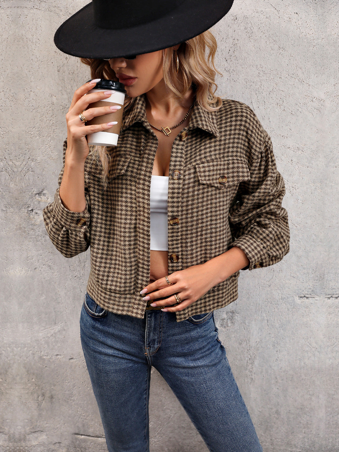 Taupe houndstooth cropped shacket with patch pockets and collared neckline.