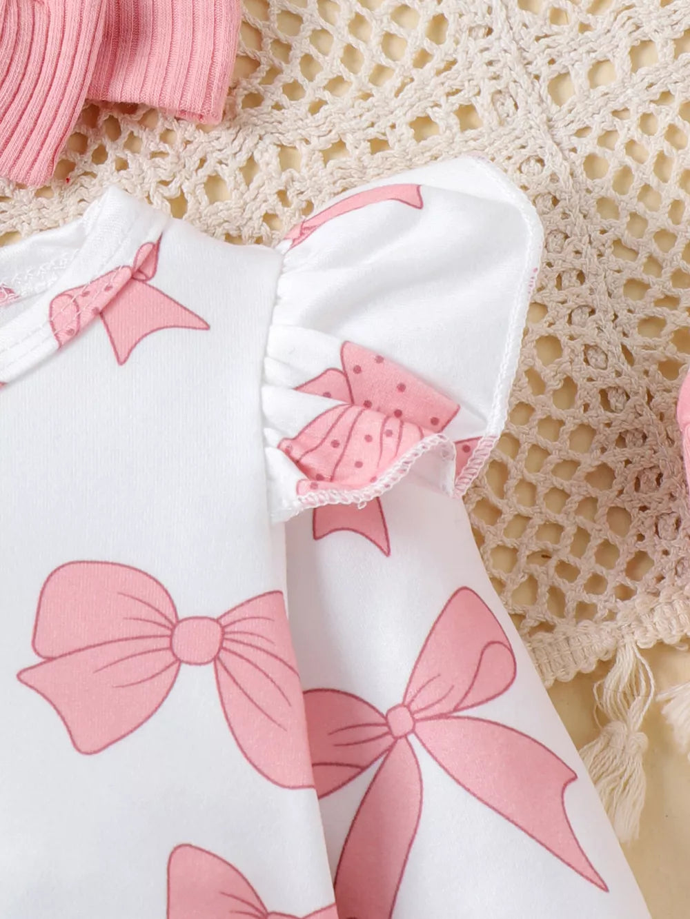Children's Bow Print Bodysuit And Pants Set in Pink, close-up detail