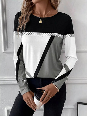 Geometric panel long sleeve t-shirt in black, white, and gray with chevron detail.