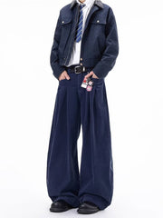 Men's navy blue corduroy wide leg sweatpants with pleats and pockets.