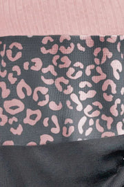 Colorblock ribbed knit top in blush pink with a gray leopard print panel.