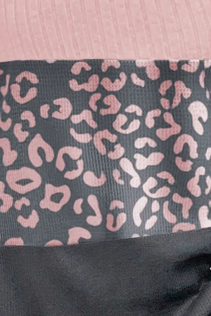 Colorblock ribbed knit top in blush pink with a gray leopard print panel.