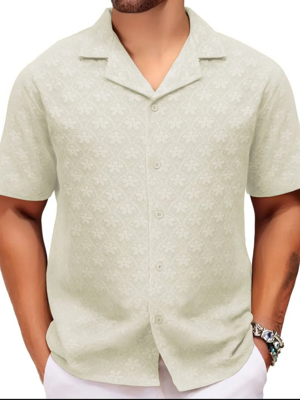 Ivory embossed floral camp collar shirt with short sleeves and button front.