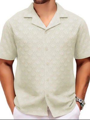 Ivory embossed floral camp collar shirt with short sleeves and button front.
