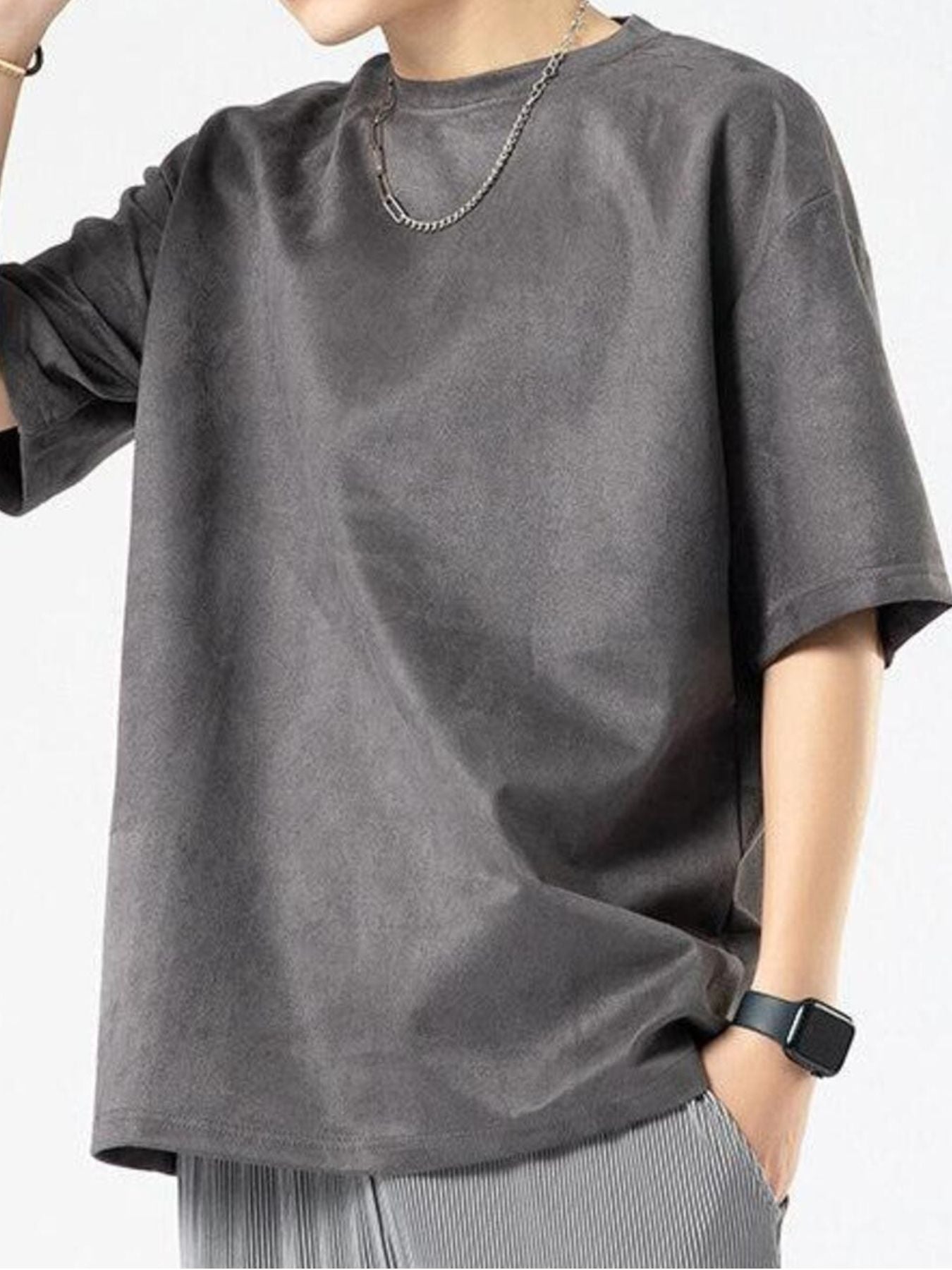 Men's oversized dark gray cotton t-shirt with a crew neck and short sleeves.