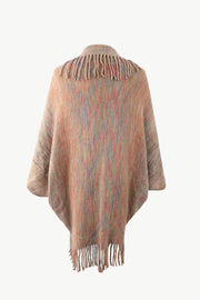 Textured stripe fringe cape in tan with multicolor yarn and fringe details.