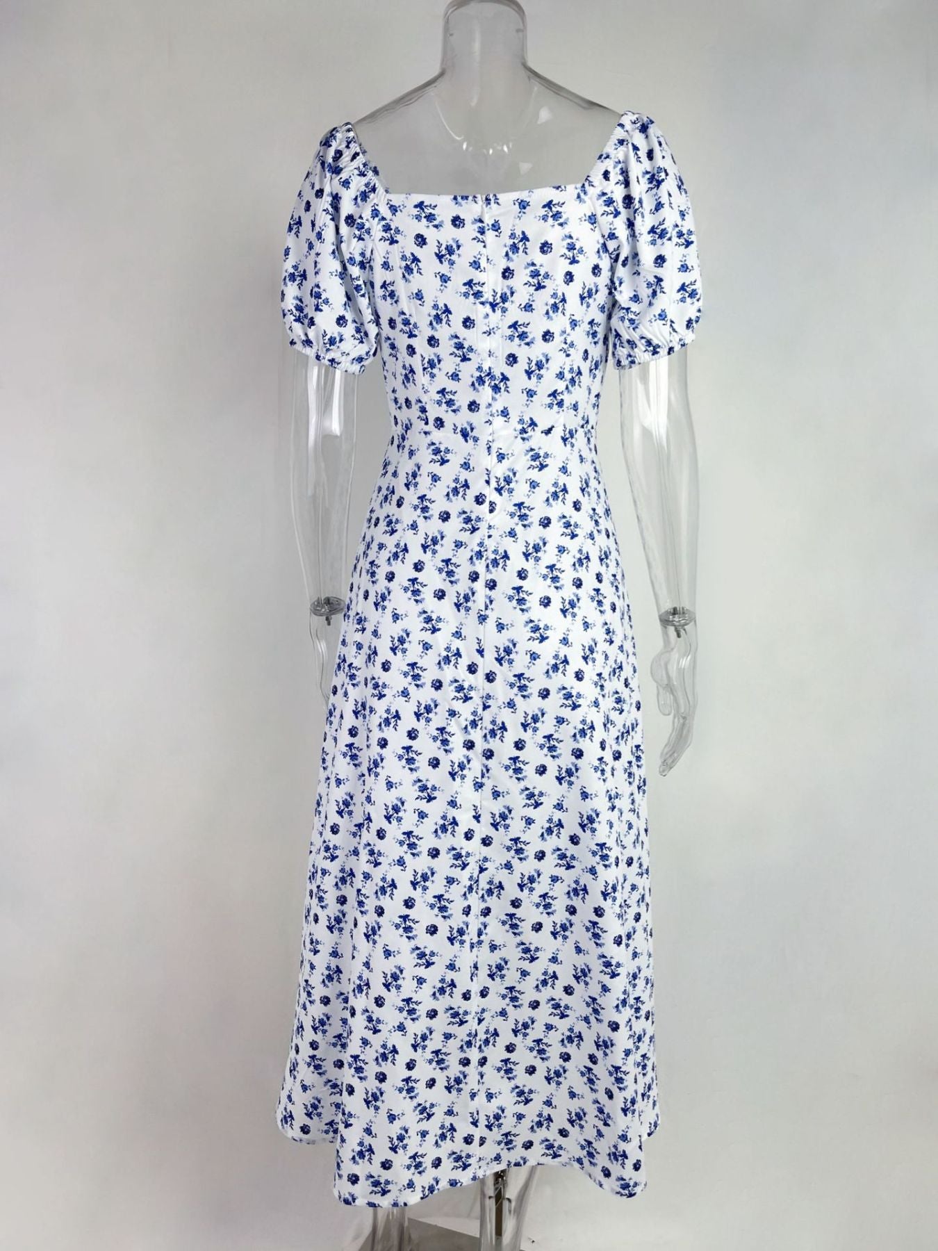 White floral print midi dress with puff sleeves and square neckline