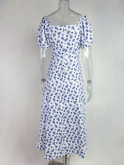 White floral print midi dress with puff sleeves and square neckline