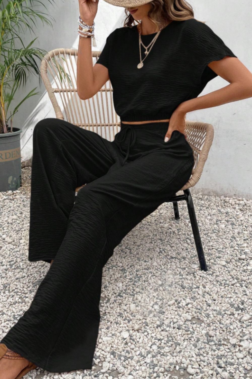 Black textured crop top and wide-leg trousers set with drawstring waist