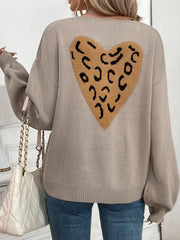 Mocha acrylic cardigan with a large leopard print heart on the back and balloon sleeves.