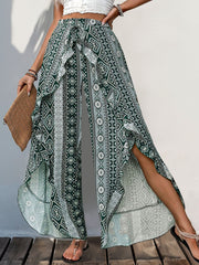 Geometric print palazzo pants in Air Force Blue with ruffle trim and high slits.