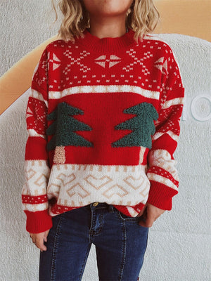 Festive red knit sweater with appliqué trees and snowflake pattern.