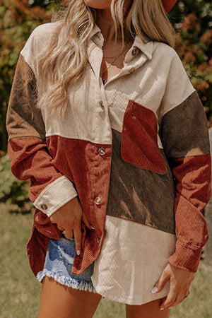Oversized corduroy shacket with colorblock patchwork in cream, rust, and brown.