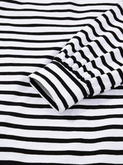 Black and white striped collared long sleeve dress with button detail on cuff.