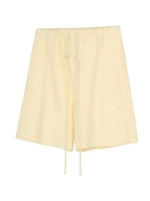 Men's beige jogger shorts with drawstring and elastic waist.