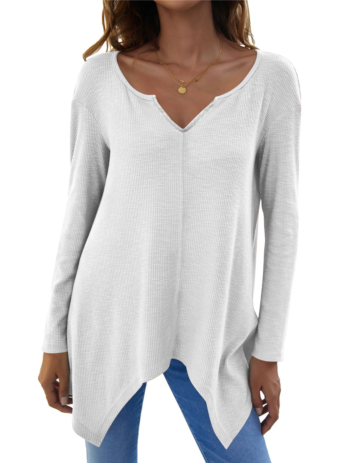 White ribbed knit tunic with v-neck and asymmetric hem