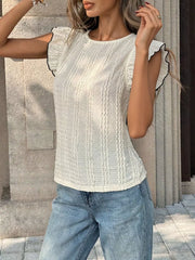 White crinkled texture t-shirt with ruffled sleeves and black trim.