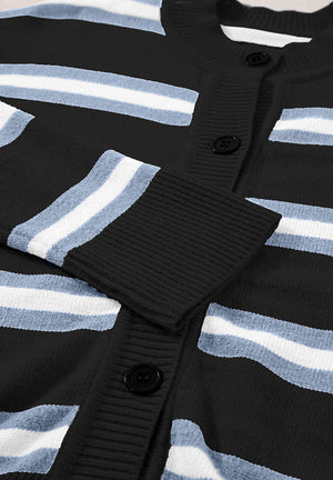 Black knit cardigan with white and blue stripes and button front.