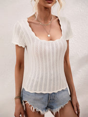 White knit top with scalloped square neckline and short sleeves, featuring a subtle openwork pattern.