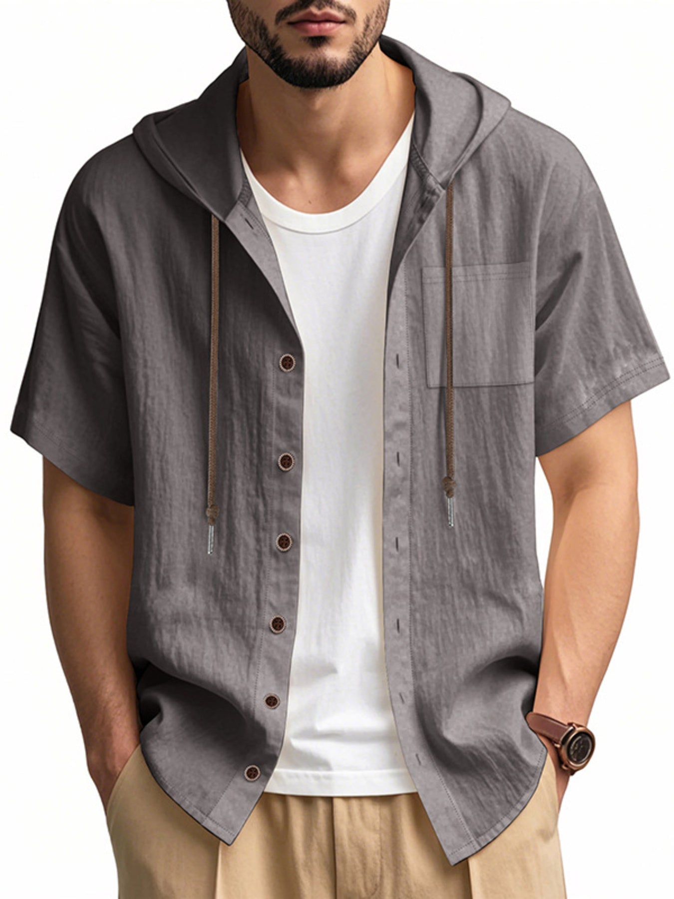 Men's dark gray short sleeve hooded shirt with pocket and buttons, worn over white tee.