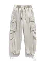 Men's Paris Gray drawstring cargo pants with multiple pockets and adjustable cuffs.