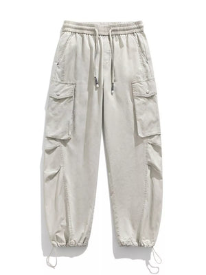 Men's Paris Gray drawstring cargo pants with multiple pockets and adjustable cuffs.